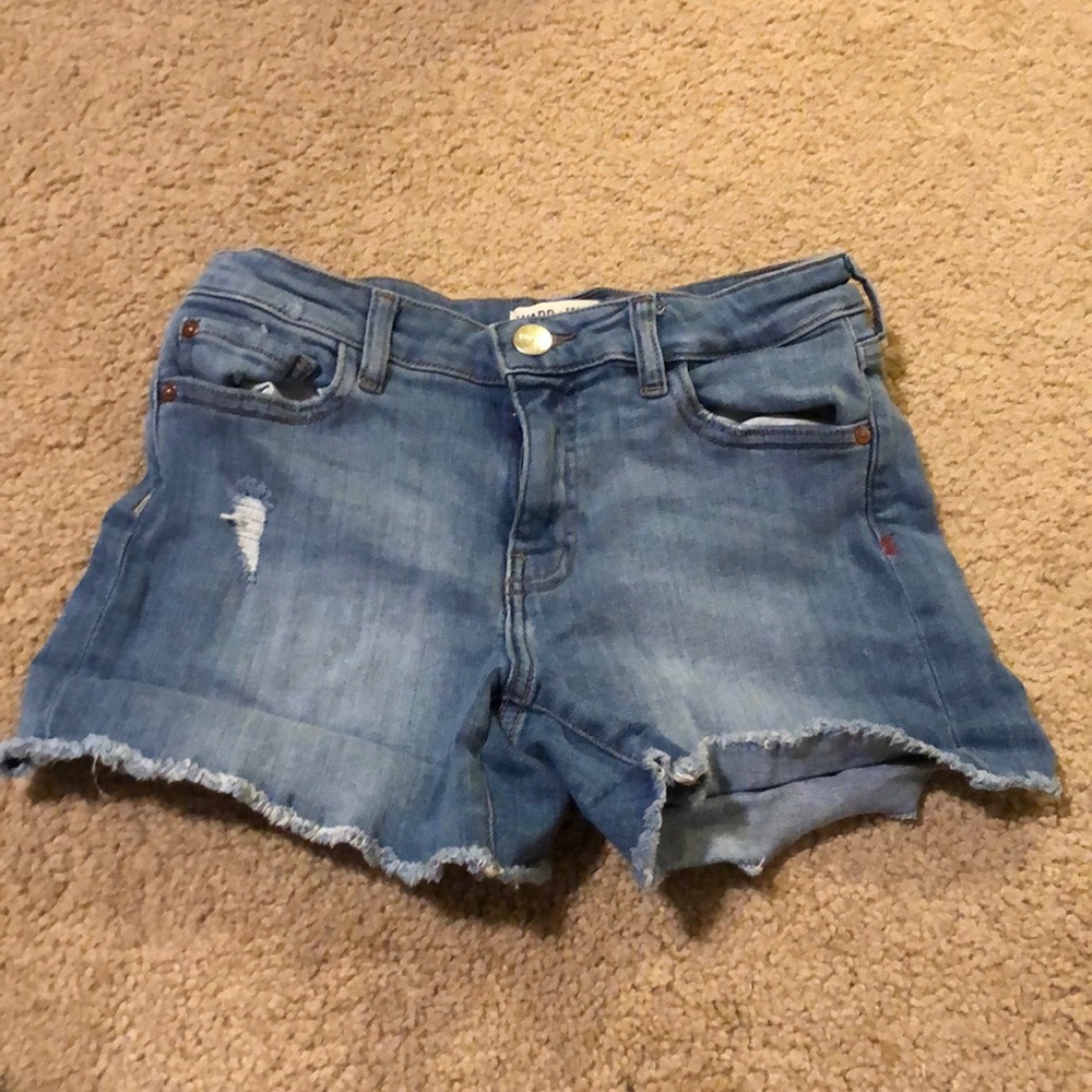 Light wash jean shorts.